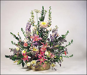  floral garden arrangement in wicker basket 